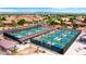 Aerial view of well-maintained pickleball courts in a vibrant residential community at 4138 E Indigo St, Gilbert, AZ 85298