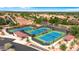 Aerial shot of tennis courts surrounded by trees and lush landscaping in the community at 4138 E Indigo St, Gilbert, AZ 85298