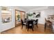 Bright dining room with stylish seating, and a view of the patio at 4151 E Mercer Ln, Phoenix, AZ 85028