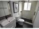 Elegant bathroom featuring a modern vanity, glass shower with black hardware and black hexagon tile flooring at 4206 N 38Th St # 3, Phoenix, AZ 85018