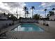 Sparkling community pool with lounge chairs and lush landscaping, offering a resort-like experience at 4206 N 38Th St # 3, Phoenix, AZ 85018