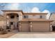 Beautiful two-story home with a three car garage and neutral stucco exterior at 45105 W Horse Mesa Rd, Maricopa, AZ 85139