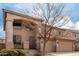 Beautiful two-story home with a three car garage and neutral stucco exterior at 45105 W Horse Mesa Rd, Maricopa, AZ 85139