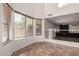 Bright living area with large windows and tile flooring at 45105 W Horse Mesa Rd, Maricopa, AZ 85139