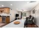 Open-concept living area seamlessly connecting to the kitchen, with a bright and airy atmosphere at 4701 E Voltaire Ave, Phoenix, AZ 85032