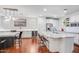 Bright dining area with built-in cabinets and bar area conveniently located near the kitchen at 4705 E Betty Elyse Ln, Phoenix, AZ 85032