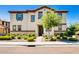 Charming two-story home with manicured landscaping, a brick walkway, and neutral toned exterior at 4705 E Betty Elyse Ln, Phoenix, AZ 85032