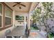 This covered patio features an outdoor dining area and a garden at 4705 E Betty Elyse Ln, Phoenix, AZ 85032