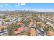 Aerial view of the townhome community showing ample parking, mature landscaping, and mountain views at 4901 E Kelton Ln # 1227, Scottsdale, AZ 85254