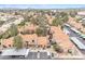 Birds-eye view of townhomes, landscaped grounds, and parking areas with views of mountains in the background at 4901 E Kelton Ln # 1227, Scottsdale, AZ 85254