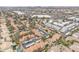 Overhead view of the townhome community, parking and nearby shopping in a suburban environment at 4901 E Kelton Ln # 1227, Scottsdale, AZ 85254