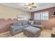 Living room showcasing a comfortable sectional sofa, plush rug, and stylish decor, creating a cozy atmosphere at 4901 E Kelton Ln # 1227, Scottsdale, AZ 85254