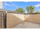 Private walled-in patio space with stucco walls and blue sky at 4901 E Kelton Ln # 1227, Scottsdale, AZ 85254