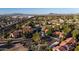 Expansive aerial shot of a well-maintained community near the mountains at 5230 E Brown Rd # C117, Mesa, AZ 85205