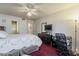 Main bedroom with ceiling fan and attached bathroom offers ample space and lots of closet space at 5230 E Brown Rd # 117, Mesa, AZ 85205