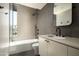 Modern bathroom features sleek tiles, contemporary fixtures, and a shower-over-tub at 5287 N Invergordon Rd, Paradise Valley, AZ 85253