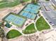 An aerial view of tennis courts near a golf course and recreation area with a parking lot at 6050 S Crosscreek Ct, Chandler, AZ 85249