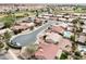 An aerial view of the residential area, showcasing the neighborhood layout with golf course in the background at 6050 S Crosscreek Ct, Chandler, AZ 85249