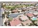 A panoramic aerial view of a residential neighborhood with golf course and mature landscaping at 6050 S Crosscreek Ct, Chandler, AZ 85249