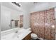 Bathroom with white vanity and patterned shower curtain at 61 S 111Th Pl, Mesa, AZ 85208