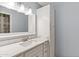 Bathroom featuring vanity with marble countertop and white cabinetry at 7819 E Coolidge St, Scottsdale, AZ 85251