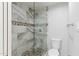 Tile shower with glass enclosure at 7819 E Coolidge St, Scottsdale, AZ 85251