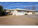 Charming single-story home with xeriscape front yard and blue sky at 913 N Trekell Rd, Casa Grande, AZ 85122