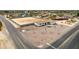 Aerial view of the neighborhood highlighting the landscaped yards, the expansive lots, and charming streets at 9305 W Calle Lejos --, Peoria, AZ 85383