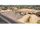 Aerial view of a beautifully landscaped property, showcasing its expansive yard and charming neighborhood at 9305 W Calle Lejos --, Peoria, AZ 85383