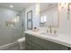 Beautiful new bathroom features walk in glass shower, dual vanity and modern fixtures at 9305 W Calle Lejos --, Peoria, AZ 85383