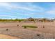 Street view of landscaped neighborhood with blue skies and mountain views at 9305 W Calle Lejos --, Peoria, AZ 85383