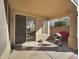 Outdoor patio area featuring a grill and sliding glass door entry to the home at 9477 W Tonopah Dr, Peoria, AZ 85382