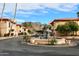 Well-maintained community with a fountain and mountain views, showcasing the scenic surroundings at 10218 N 12Th Pl # 2, Phoenix, AZ 85020