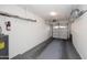 Clean garage with ample space and organizational shelving for storage at 10218 N 12Th Pl # 2, Phoenix, AZ 85020