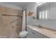 Bathroom featuring a modern sink, shower and toilet at 10226 W Snead S Cir, Sun City, AZ 85351