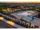 Aerial view of the community pool and outdoor areas, showcasing the inviting space for recreation and relaxation at 10322 E Topaz Ave, Mesa, AZ 85212