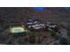 Panoramic aerial view of a modern estate with a pool, tennis court and surrounded by desert landscape at 10324 E Calle De Las Brisas --, Scottsdale, AZ 85255