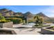 Backyard area featuring a pool, desert landscaping and amazing mountain views at 10324 E Calle De Las Brisas --, Scottsdale, AZ 85255