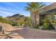 Contemporary home with lush desert landscaping along brick driveway at 10324 E Calle De Las Brisas --, Scottsdale, AZ 85255