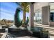 Contemporary home entrance featuring a unique black fountain and modern sculpture with mountain views at 10324 E Calle De Las Brisas --, Scottsdale, AZ 85255