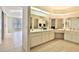 Spacious bathroom featuring tile floors, a single sink vanity and skylight at 10421 E Silvertree Dr, Sun Lakes, AZ 85248