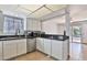 Bright kitchen area showcases granite countertops and stainless steel dishwasher at 10421 E Silvertree Dr, Sun Lakes, AZ 85248