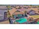 Aerial view of a home with a private pool in a well-maintained neighborhood at 10942 E Sonrisa Ave, Mesa, AZ 85212