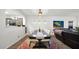 Elegant dining room featuring a dark wood table and an open design at 10942 E Sonrisa Ave, Mesa, AZ 85212