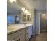 Bright bathroom featuring double sinks, neutral color palette, and modern fixtures at 10968 W Baden St, Avondale, AZ 85323