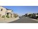 A view down the street with houses at 10968 W Baden St, Avondale, AZ 85323