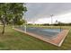 Community basketball court on a cloudy day, providing residents with a space for exercise and recreation at 1114 S Presidio Ave, Gilbert, AZ 85233