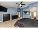 Stylish bedroom with blue walls and carpeted floors at 1114 S Presidio Ave, Gilbert, AZ 85233