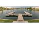 Community boat dock on the water, offering residents convenient access for boating, and enjoying waterside activities at 1114 S Presidio Ave, Gilbert, AZ 85233