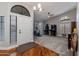 Bright foyer with hardwood floors, a large arched window, and neutral-colored walls at 1114 S Presidio Ave, Gilbert, AZ 85233